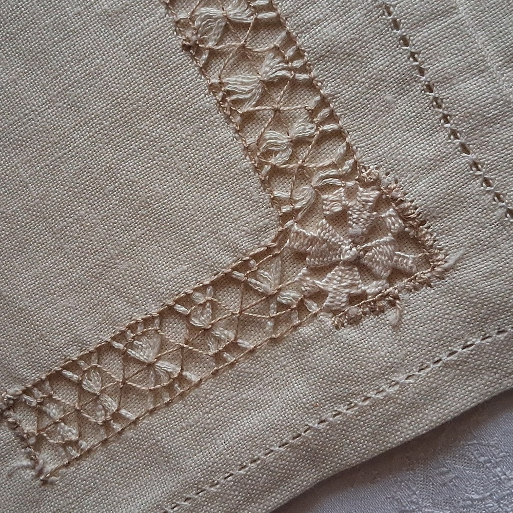 Set of twelve (12) elegant cream-colored lace-trimmed linen dinner napkins